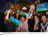 PARIS:  UMP's  Supporters celebrate victory