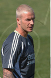 DAVID BECKHAM showing off his new short, blonde haircut while training with Real Madrid