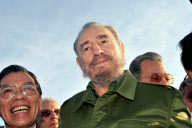 Fidel Castro and Nong Duc Manh at airport