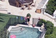Victoria Beckham with american flag towel