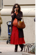 Pregnant actress MINNIE DRIVER showing off her baby bump in New York