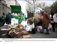 PARIS: Scavengers go through dustbins for food