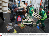 PARIS: Scavengers go through dustbins for food