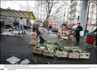 PARIS: Scavengers go through dustbins for food