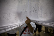 China Mourns Childrens' Deaths from Earthquake