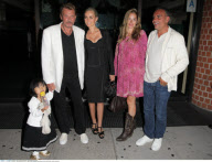 Singer JOHNNY HALLYDAY and his family at 'Mr. Chow' restaurant