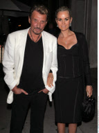 Singer JOHNNY HALLYDAY and his family at 'Mr. Chow' restaurant