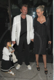 Singer JOHNNY HALLYDAY and his family at 'Mr. Chow' restaurant