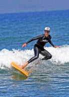 Helen Hunt wipes out surfing