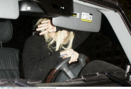 Billionaire twin ASHLEY OLSEN not in the mood for photos