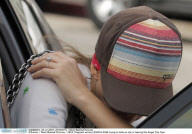 Pregnant actress JESSICA ALBA trying to hide as she is leaving the Angel City Gym