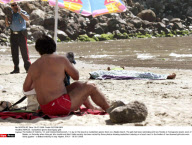 NAPLES : Sunbathers ignore dead Gypsy girls