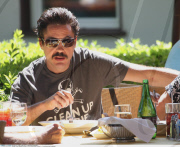 Actor ROBERT DOWNEY JR munching a bowl spaghetti