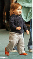 EXCL.: Actress AMANDA PEET and her family arriving at Vancouver airport