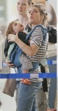 EXCL.: Actress AMANDA PEET and her family arriving at Vancouver airport