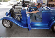 Musician JOHNNY HALLYDAY driving his 1932 Ford vintage roadster