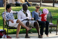 Top model HEIDI KLUM and SEAL taking their kids to a playground