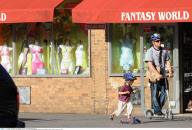 Actor MATTHEW BRODERICK and son JAMES on their scooters in New York City