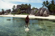 FISHERMAN WITH OCTOPUSES, SOURCE DÔARGENT, LA DIGUE ISLAND, SEYCHELLES