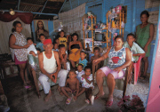 FAMILY INSIDE THERE HOUSE IN THE FISHING-VILLAGE BAORUCO, DOMINICAN REPUBLIC