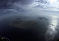 A LOOK INTO THE CHASM OF THE EXTINCT VOLCANO OF SANTORINI ISLAND, CYCLADES, GREECE