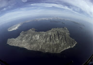 A LOOK INTO THE CHASM OF THE EXTINCT VOLCANO OF SANTORINI  ISLAND, CYCLADES, GREECE