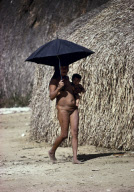 UMBRELLA SUN PROTECTION, INDIAN VILLAGE, XINGU INDIAN RESERVATION, BRAZIL