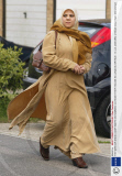 THE WIFE OF SHEIK OMAR BAKRI MOHAMMED OUTSIDE THEIR HOUSE IN LONDON, BRITAIN - 13 JUL 2005