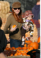 Actress MARCIA CROSS and family at the pumpkin patch