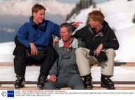 PRINCE CHARLES WITH PRINCE HENRY/ HARRY  AND PRINCE WILLIAM SKIING IN KLOSTERS SWITZERLAND