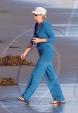 Charlize Theron and Mother Play With Dogs on the Beach