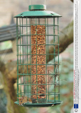 A mouse feeding from a 'squirrel-proof' Bird feeder, London, Britain - Oct 2008