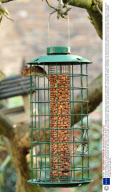 A mouse feeding from a 'squirrel-proof' Bird feeder, London, Britain - Oct 2008