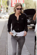 Heiress NICKY HILTON shows off her Yves Saint Laurent Y-clutch