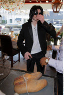 Rarely seen pop star MICHAEL JACKSON buys an airplane