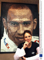 Portrait of Lewis Hamilton created  from hole punch circles, Britain  - 28 Oct 2008