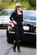 SEMI-EXCL.: Top model KATE MOSS shows off her new Prada shades & more