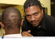 14-year-old Kwame Boyce-Deacon with the world's first Obama haircut, Leicester, Britain - 10 Nov 2008