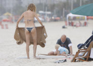 Supermodel Natalia Vodianova with his husband and son at Ipanema Beach