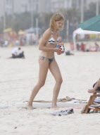 Supermodel Natalia Vodianova with his husband and son at Ipanema Beach