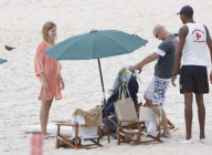Supermodel Natalia Vodianova with his husband and son at Ipanema Beach
