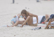 Supermodel Natalia Vodianova with his husband and son at Ipanema Beach