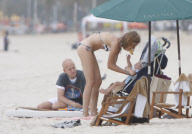 Supermodel Natalia Vodianova with his husband and son at Ipanema Beach