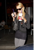 Heiress PARIS HILTON definitely has her hands full