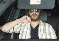 Joaquin Phoenix Wearing Pantyhose as a Glove