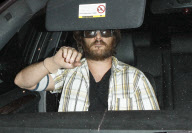 Joaquin Phoenix Wearing Pantyhose as a Glove