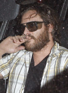 Joaquin Phoenix Wearing Pantyhose as a Glove