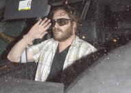 Joaquin Phoenix Wearing Pantyhose as a Glove