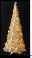 The Instant Christmas Tree in a Box, that goes from the box to twinkling in the corner in two minutes flat, Britain - 09 Nov 2008