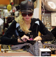 No US rights | Heiress PARIS HILTON shows off her new B.F.F. BRITTANY